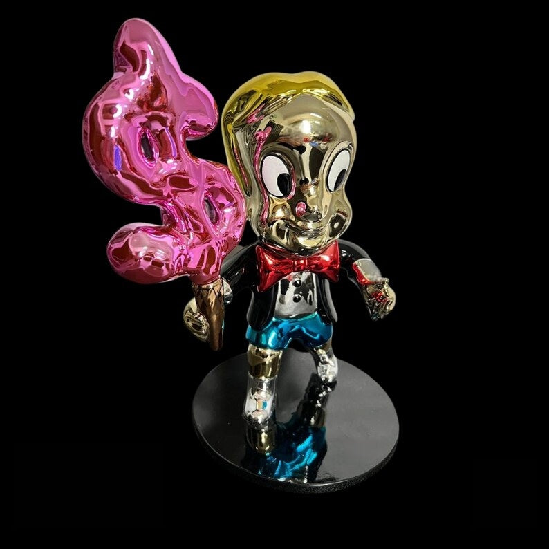 Richie Rich Sculpture with Dollar Sign Ice Cream
