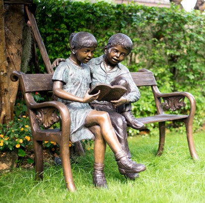 Cast Bronze Kids Reading on Bench Sculpture