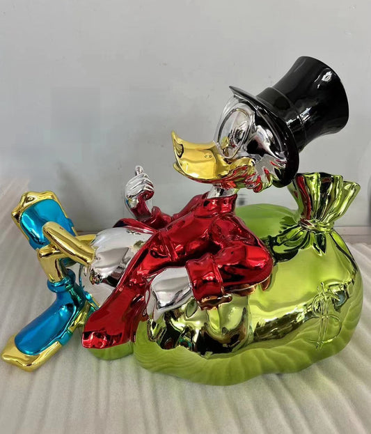 Scrooge Duck Lounging on Money Bag Sculpture